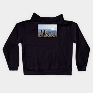 Climber passes a cairn on the summit of Ben Nevis Kids Hoodie